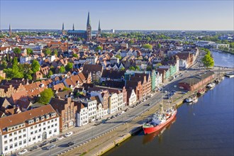 Aerial view over the river Trave and Feuerschiff Fehmarnbelt Lightship in the old town of the Hanseatic City of Luebeck