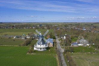 Aerial view over windmill in Borgsum on the island of Foehr in the district of Nordfriesland