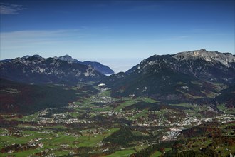 Aerial view from Mount Jenner over the village Schoenau and Mount Untersberg in autumn