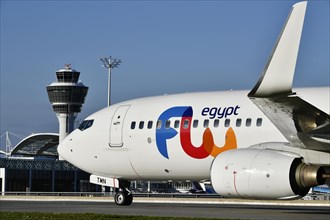 Egypt Boeing B737 taxiing in front of Terminal 1 with tower
