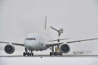 Aircraft deicing in winter in front of take-off