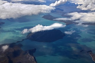 Aerial view over West-Greenland showing sea and islands