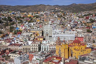 Aerial view over the colourful city centre of Guanajuato and its basilica
