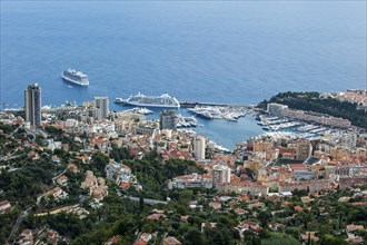 Aerial view over the city and cruise ships in the port of Monte Carlo