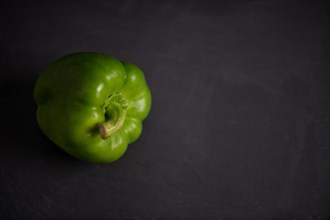 Green peppers on slate, fitness, cooking, vegetarian, vegan, vitamins, growing, garden, healthy, close up, kitchen