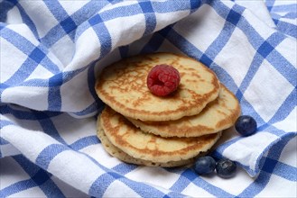 Blini, blinis on kitchen towel, mini pancakes