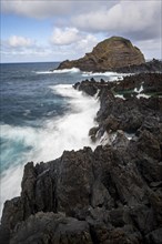 High waves on the sea, volcanic rock in bizarre shapes, rocky coast, Porto Moniz, Madeira, Portugal, Europe