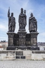 Statue of Saints Norbert of Xanten, Wenceslas and Sigismund on Charles Bridge, Prague, Czech Republic, Europe