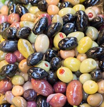 Turkish style prepared olives in the market stands