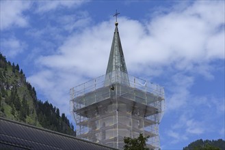 Scaffolded steeple of the St. Johannes Baptist Church, Bad hindelang, Allgaeu, Bavaria, Germany, Europe