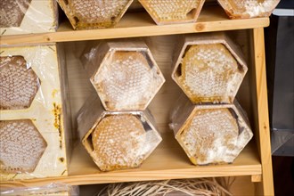 Sweet fresh honey in the sealed comb frame