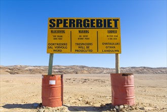 Warning sign at the diamond exclusion zone in the Sperrgebiet National Park, also Tsau ÇKhaeb National Park, Namibia, Africa