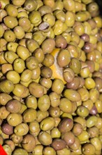 Turkish style prepared olives in the market stands