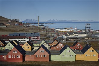 View of the town with colourful wooden houses, coal-fired power station and harbour, Longyearbyen, Isfjord, Spitsbergen