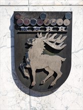 Coat of arms of Aland showing red deer with antlers, facade on the parliament building, Mariehamn, Aland Islands, Finland, Europe