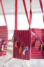 Traditional style handmade woven bags made of fabric