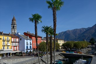 Lake promenade in Ascona with church Santi Pietro e Paolo, Lungolago, Canton Ticino, Switzerland, Europe