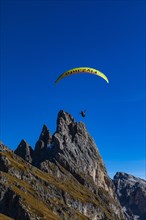 Paragliding tandem flight to the Geisler Group, Val Gardena, Dolomites, South Tyrol, Italy, Europe