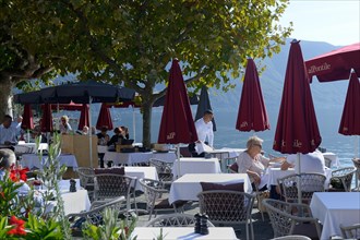 Restaurant on the lake promenade of Ascona, Canton Ticino, Switzerland, Europe