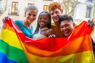 Couples of gay guys and girls lesbian in a portrait with rainbow flag, lgtb concept