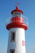 Lighthouse on a blue sky