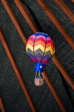 Little model colorful hot air balloon in view