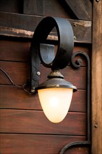 Old electric street lamps made of metal in retro style