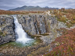 Storulfossen waterfall, Store Ula river, autumn, Rondane National Park, Norway, Europe