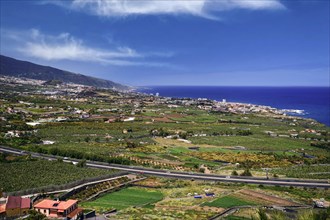 View over the Orotava valley to the Teide and Puerto de la Cruz, Tenerife, Canary Islands, Spain, Europe