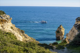 Beautiful cliffs and rock formations by the Atlantic Ocean at Seven Hanging Valleys Trail in Algarve, Portugal, Europe
