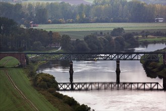 Kennedy Bridge, historic railway bridge over the Weser, architect Josef Stuebben, foggy atmosphere in autumn, Boffzen, Holzminden, Lower Saxony, Germany, Europe