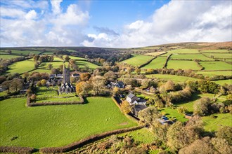 St Pancras Church in Widecombe in the Moor from a drone, Haytor Rocks, Dartmoor National Park, Devon, England, United Kingdom, Europe