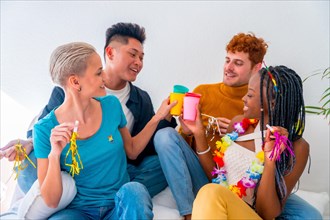 Lgtb couples of gay boys and girls lesbian in a portrait on a sofa at a house party, birthday party, toasting with glasses