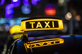 Taxi stand with taxi in the city centre at night, symbol photo, Stuttgart, Baden-Wuerttemberg, Germany, Europe