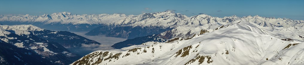 View over Davos peaks into Schanfigg and Rhine valley with Buendner Vorab, Piz Segnas and Ringelspitz, drone image, Haupter Taelli, Davos, Grisons, Switzerland, Europe