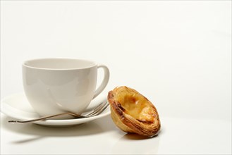 Pastel de Nata, Pasteis de Nata with coffee cup, custard tart, Portuguese speciality