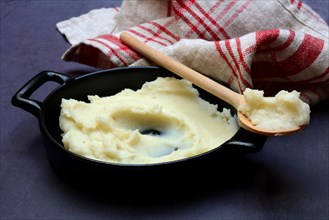 Mashed potatoes, mashed potatoes in bowl with cooking spoon