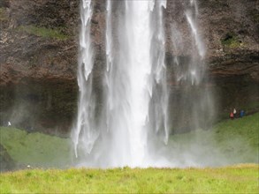 Water plunges into the depths, waterfall, Seljalandsfoss, highland break-off, south coast, Iceland, Europe