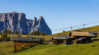 The Adler Mountain Lodge In the evening light, in the back the peak of the Sciliar, Alpe di Siusi, Val Gardena, Dolomites, South Tyrol, Italy, Europe