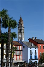 Lake promenade in Ascona with church Santi Pietro e Paolo, Lungolago, Canton Ticino, Switzerland, Europe