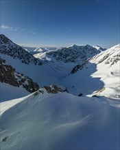 View over Strela Pass and rocky path to Strela summit and Haupter Taelli, drone shot, Davos, Grisons, Switzerland, Europe