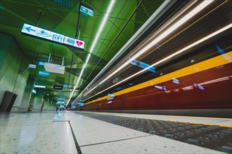 Blurred train in movement on the subway station