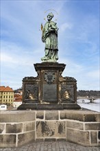 Statue of St. John of Nepomuk on Charles Bridge, Prague, Czech Republic, Europe