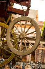 Old traditional style wagon wheel made of wood