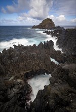 High waves on the sea, volcanic rock in bizarre shapes, rocky coast, Porto Moniz, Madeira, Portugal, Europe