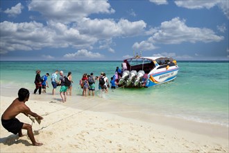 Tourists return to Krabi by moto boat after a day trip from Ko Poda Beach, Thailand, Asia