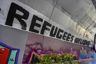 Refugees welcome, graffiti, access road to Kempten main station, Allgaeu, Bavaria, Germany, Europe