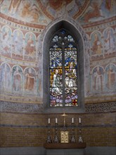 Church windows and apse paintings from the late 11th century in the Catholic parish church of St. Peter and Paul, former collegiate church, Romanesque columned basilica, Unesco World Heritage Site, Ni...