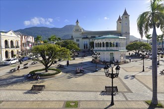 View of the Parque Independenzia, with Pavilion and Cathedale de San Felipe Apostolo in the Centro Historico, Old Town of Puerto Plata, Dominican Republic, Caribbean, Central America