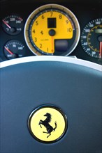 Ferrari horse emblem on steering wheel inside the F430